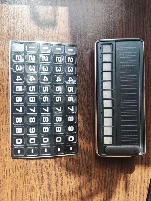 Табелка с телефонен номер при паркиране на автомобил