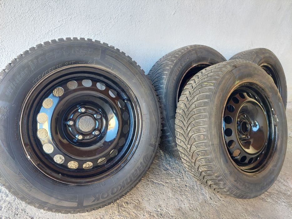Anvelope iarna cu jante 205  55  r15 + set capace noi