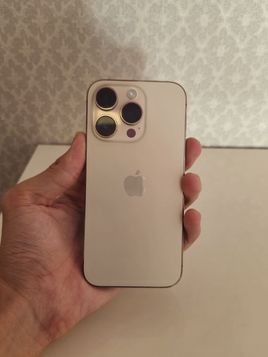 iPone 14 Pro золотистый.
