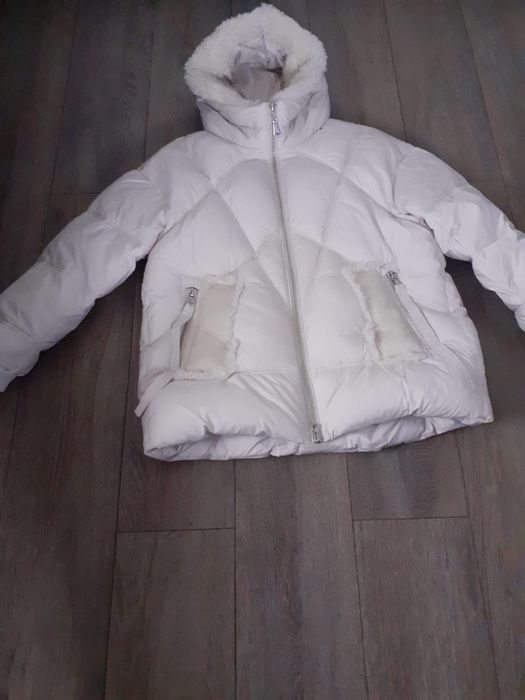 Продам  новую женскую куртку и обувь