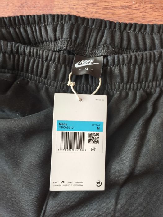 Pantaloni Nike flared