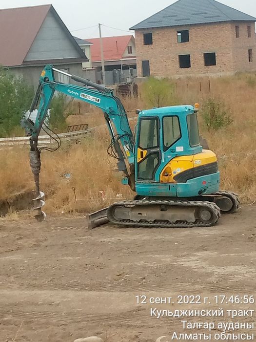 Услуги мини экскаватора ямобур ,гидромолот и тд