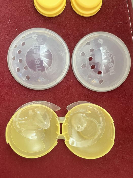 Помпа за кърма Medela Solo + пълен комплект аксесоари за успешно кърме