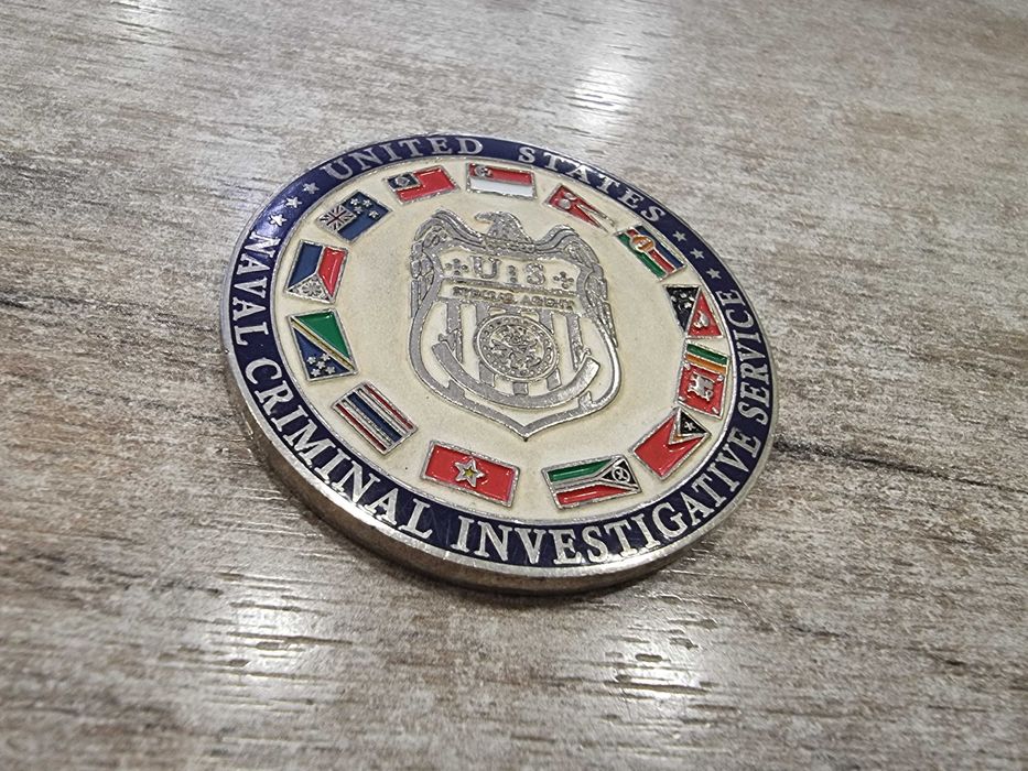 Монета NCIS Singapore