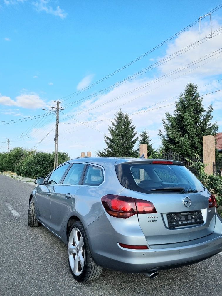 Opel  astra  2,0  Recent   Adus   2012