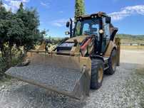 Buldoexcavator CAT 428 F Caterpillar