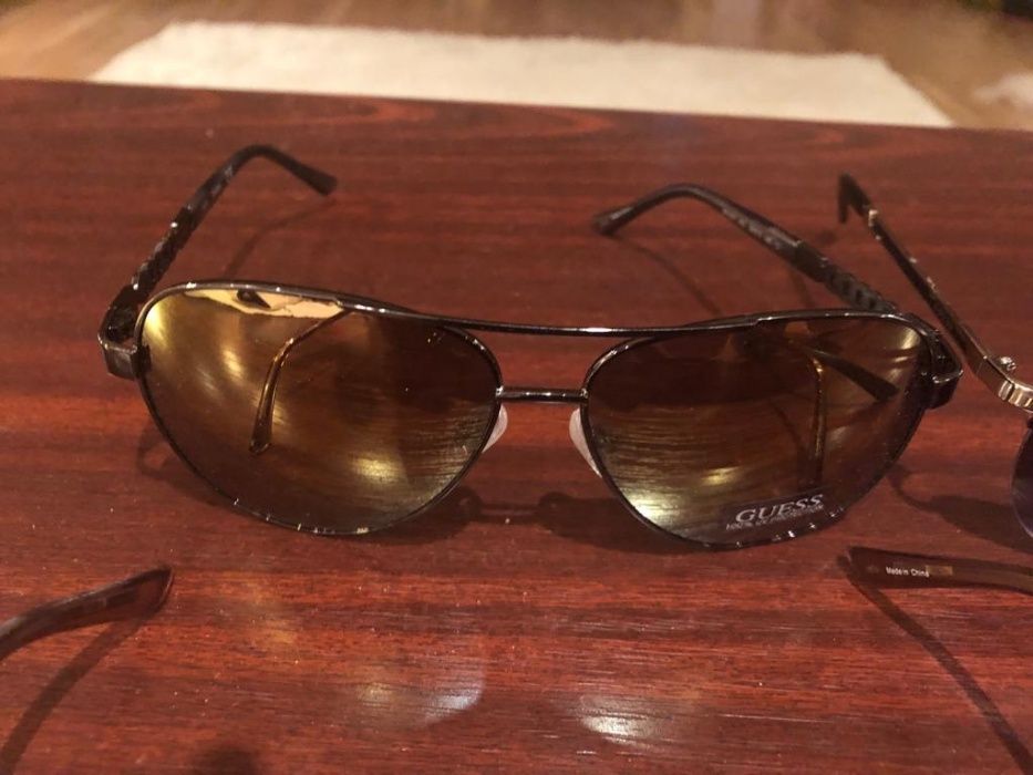 Vand ochelari de soare originali unisex GUESS ,polarizati