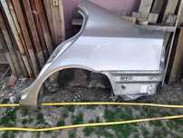 Aripă și contraaripă stânga Skoda Octavia, model 2006