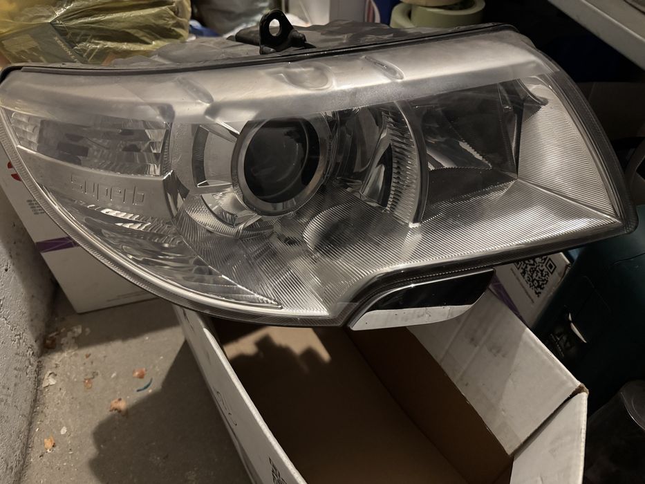 Far bixenon adaptiv  Skoda Superb 2 fara facelift stg si dreapta