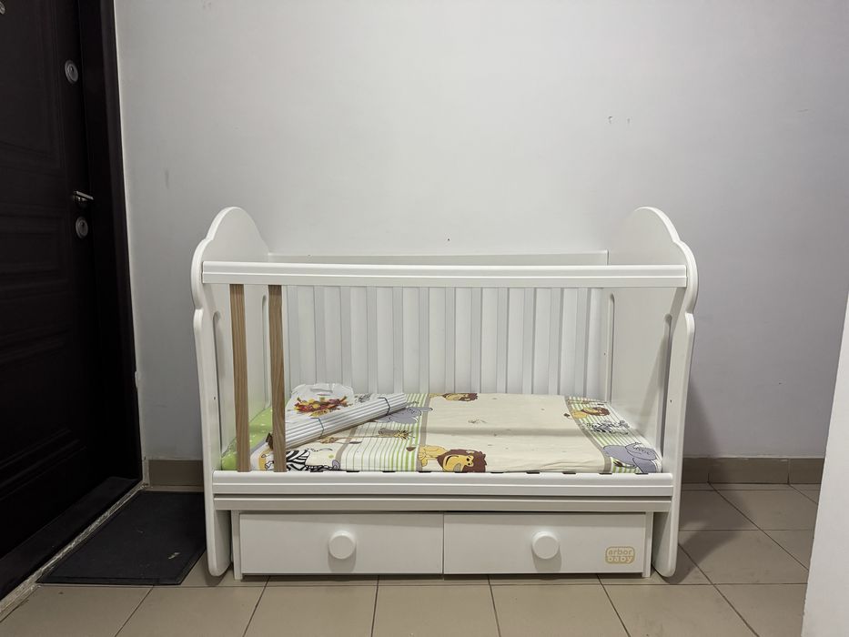 Pătuț copil cu sistem legănare