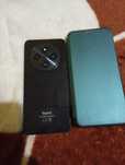 Vănd redmi 14c folie ofer și husa telefonul e că nou