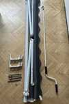 Marchiza retractabila manuala cu brat si suruburi 2x1.5 m nefolosita