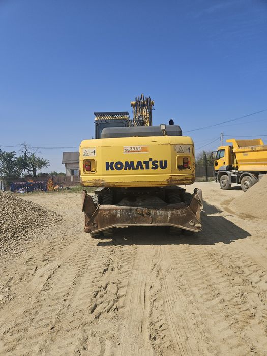 Excavator pe roți komatsu pw 180