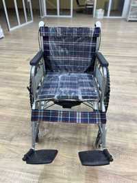 Инвалидная коляска для людей с ограниченными возможностями
С тарой