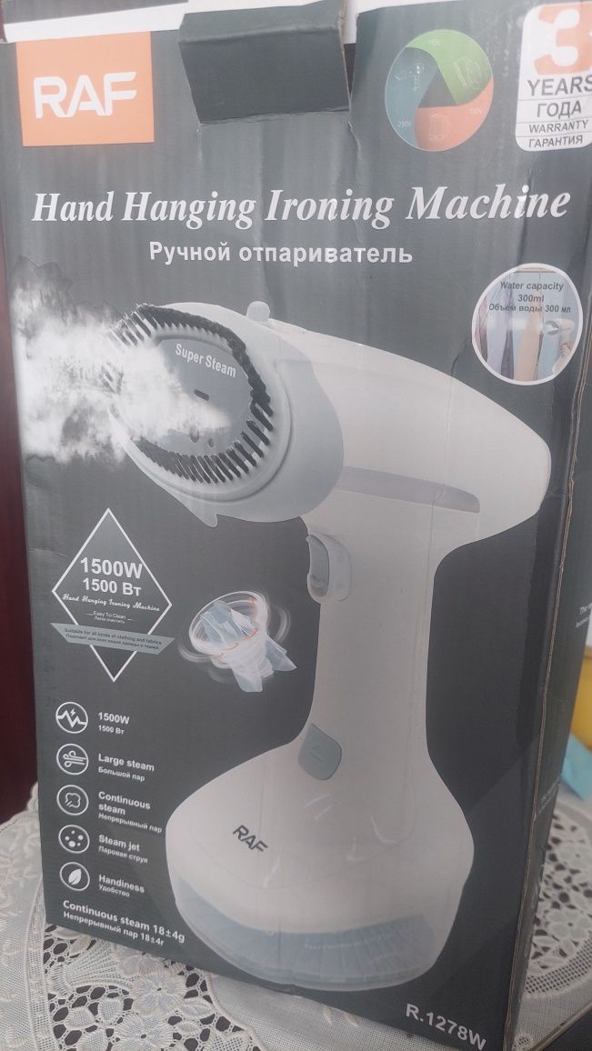 Новый ручной отпариватель
