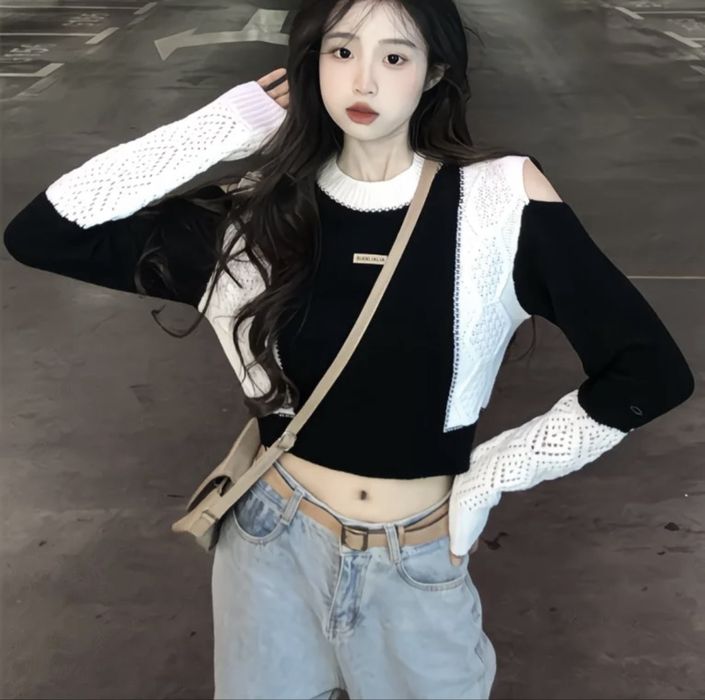 Черно белый вязаный свитер, отлично подойдет для осени и зимы.