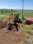 Inchiriem buldo / buldoexcavator pentru sapaturi, santuri, fundații