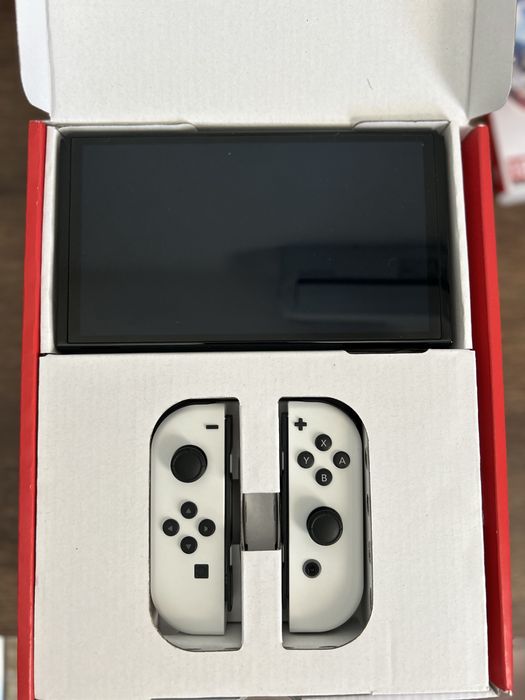 Vand nintendo switch oled cu joc mortal kombat 1