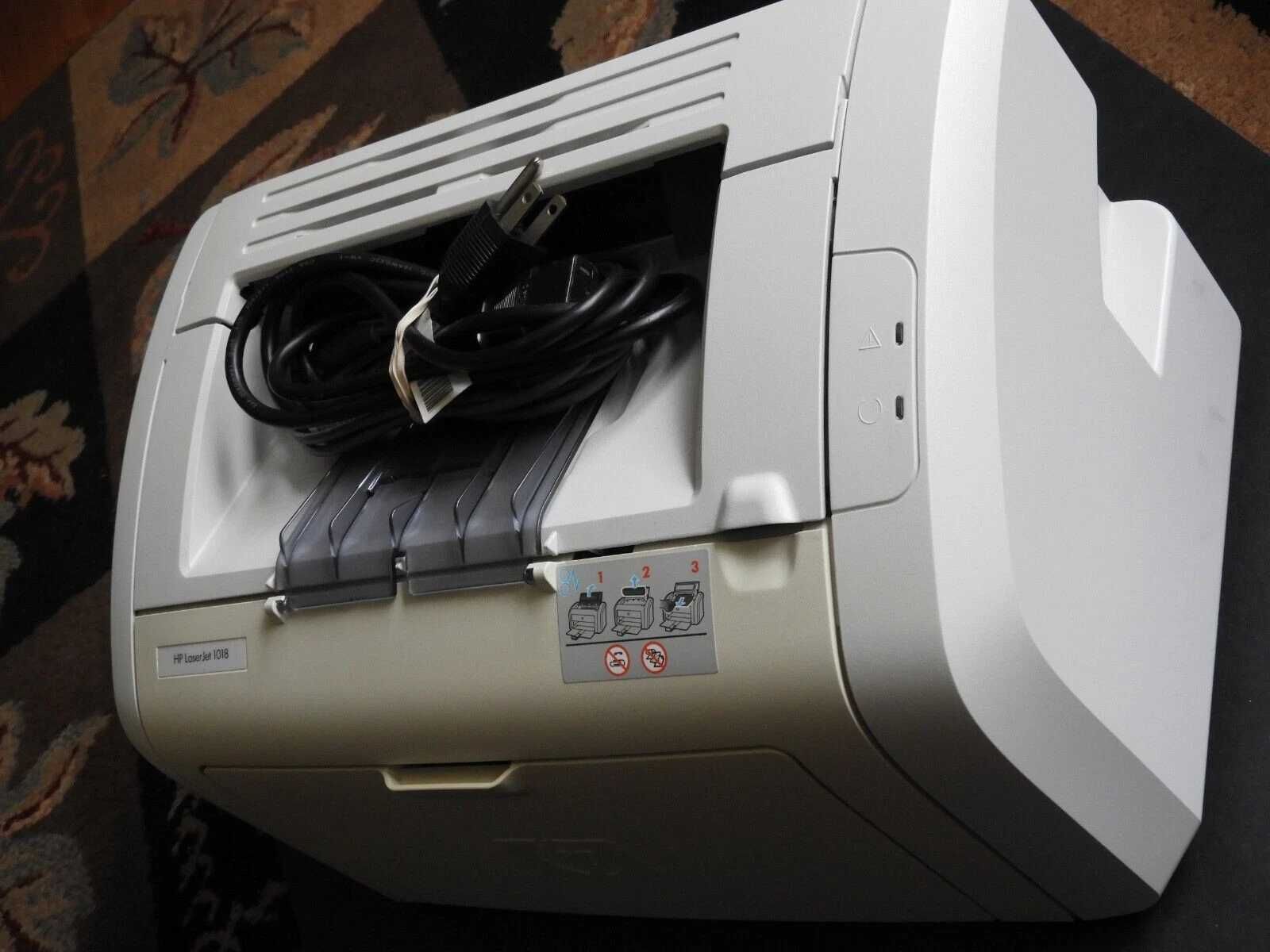 HP LaserJet 1018 - Принтер лазерный, черно-белый.