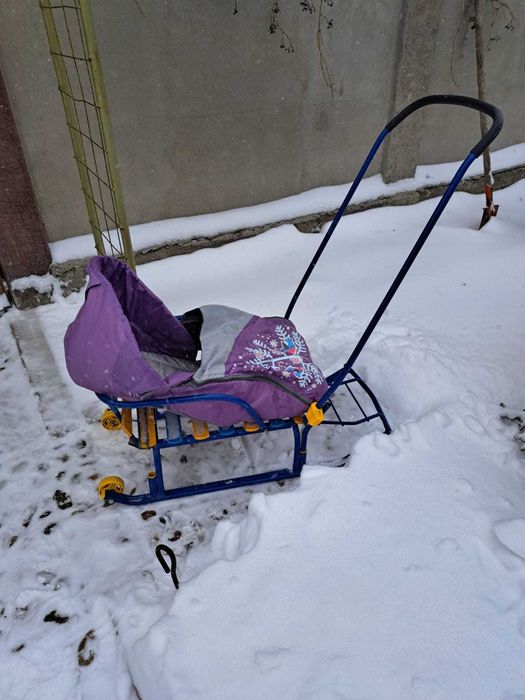 Продам санки с колёсами и чехлом