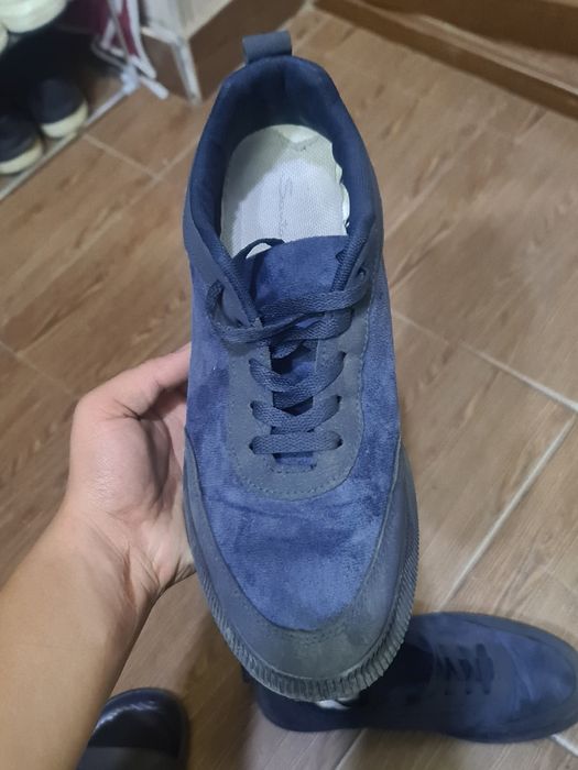 Santoni guanjo òrtacha sifat