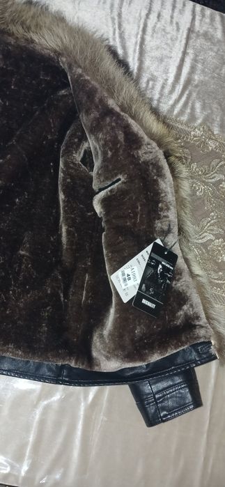 Куртка кожанные с волчатим мехом