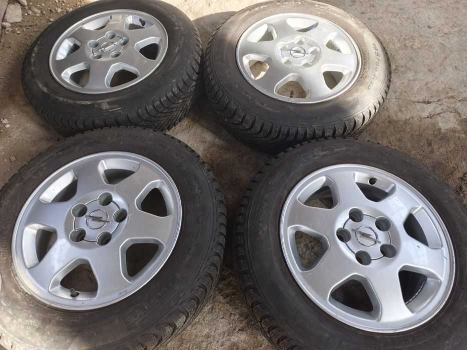 Продавам 4 зимни с алуминиеви джанти опел 5 110