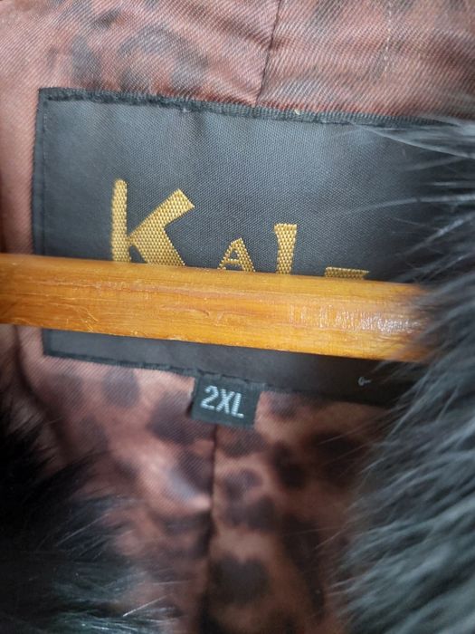 Меховая жилетка L - XXL