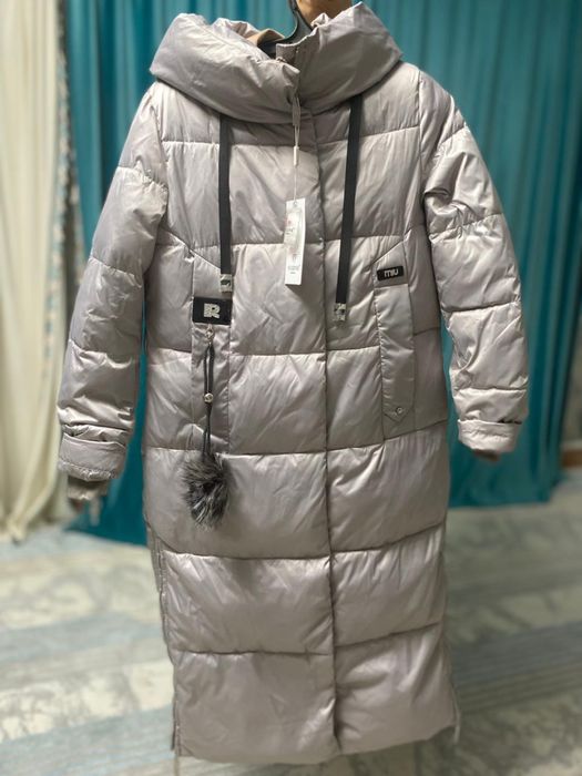 Продам новый зимний пуховик