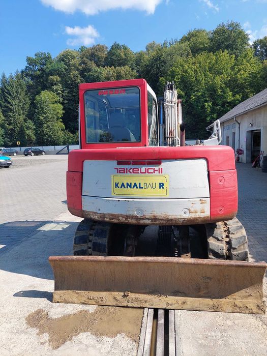EXCAVATOR Takeuchi,senile de cauciuc,4 cupe