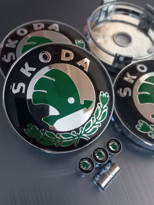 Skoda - skoda/vrs-Set 4 capace  si ventile pentru jante aliaj.