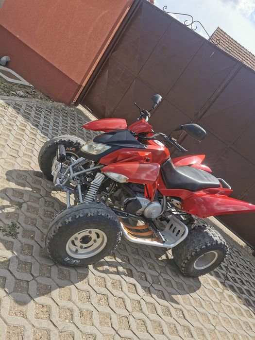 Vând quad access