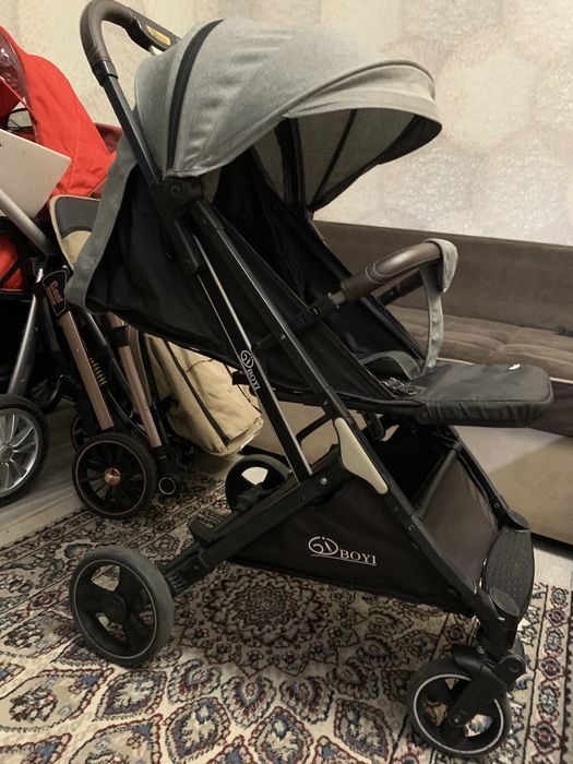 Продам детскую коляску чемодан Boyi