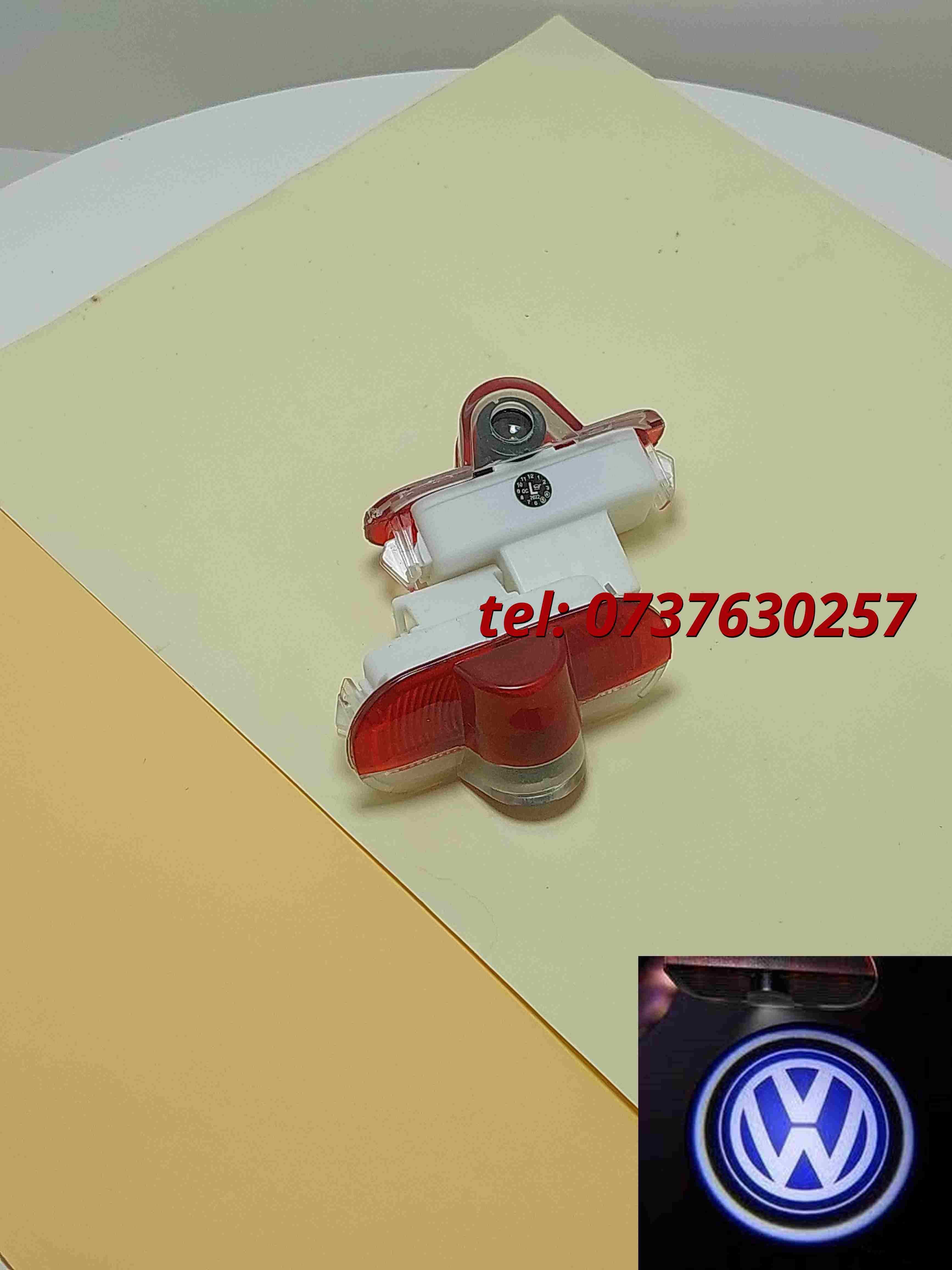 Proiectoare Logo Portiere Vw Golf 4 Caddy Touran Bora Passat