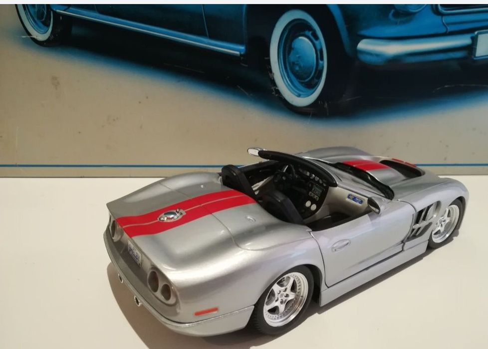 Shelby series1, anul1999 bburago 
Scara 1:18
Bburago

Pozele fac parte