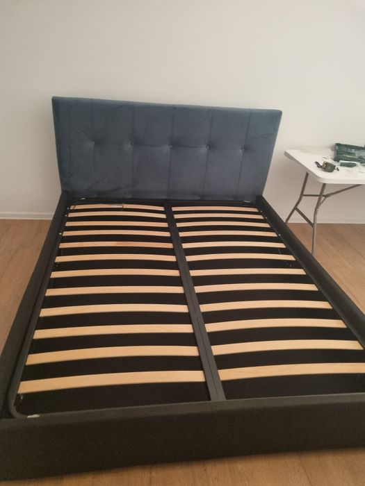 Pat tapitat AMORE NEW cu somiera rabatabila si spatiu de depozitare