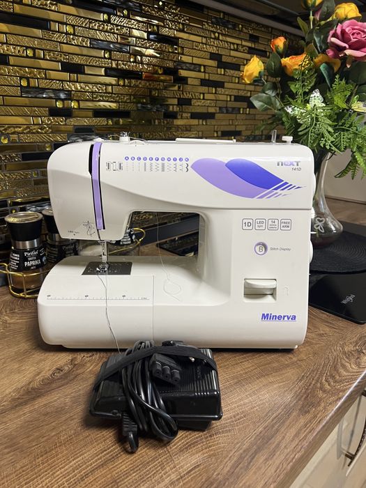 Masina de cusut portabilă electrică