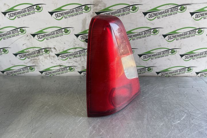 Lampa / Tripla stop stanga pe aripa 89070453 Dacia Logan prima genera