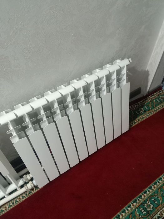 Продаю две десяти секционные радиаторы,новые, отличного качества по ли