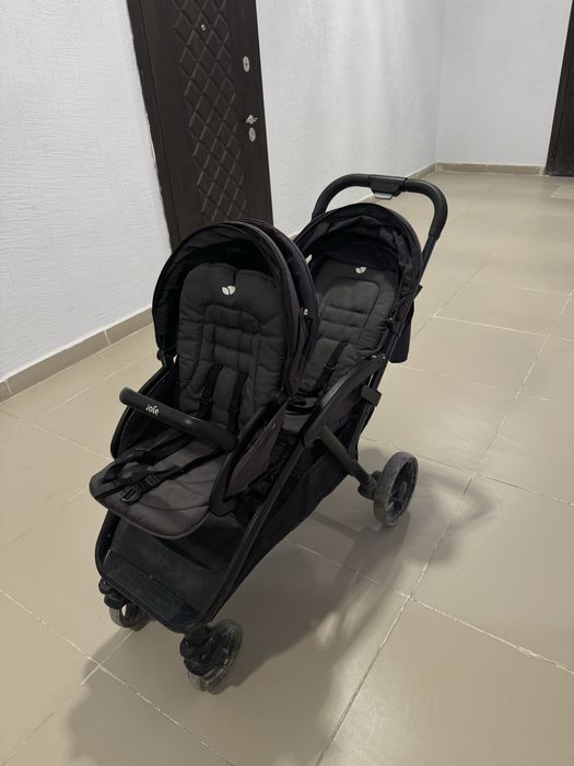 Коляска для двоих детей