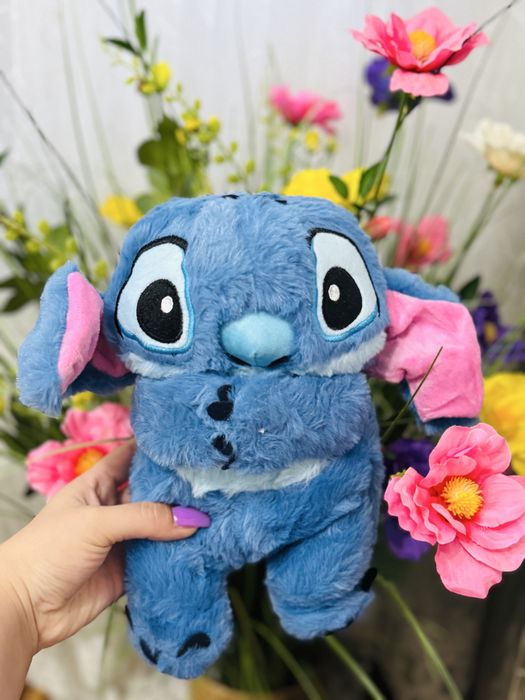 Ursulet plus stitch canta si respira