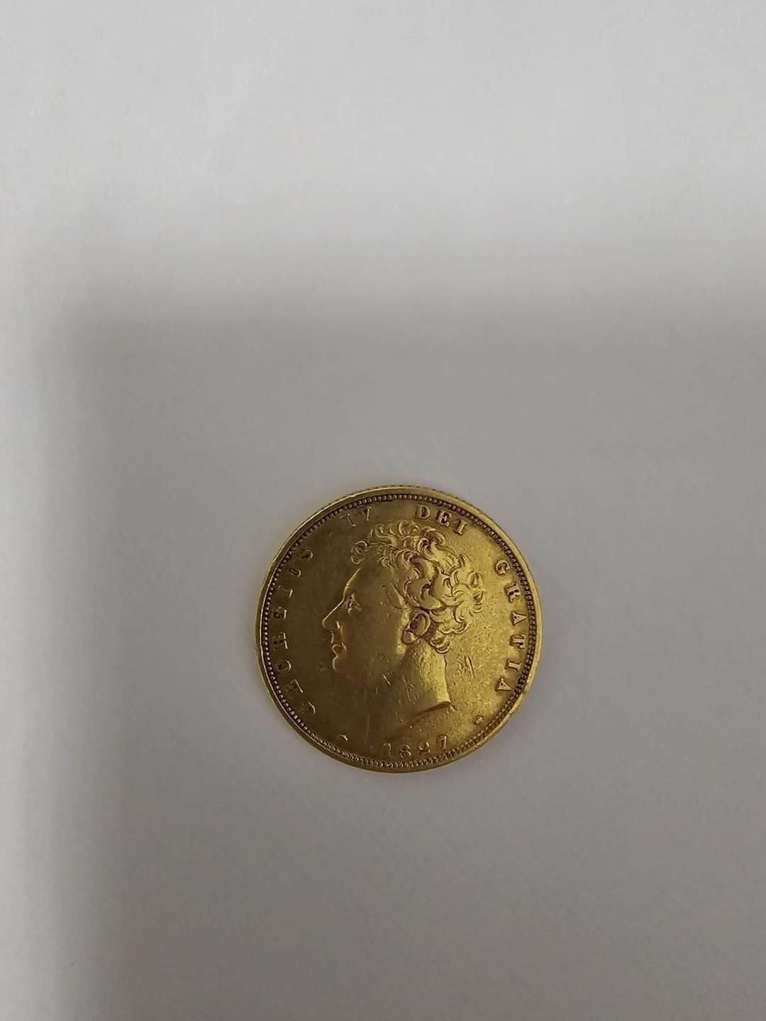 Moneda de aur 22k