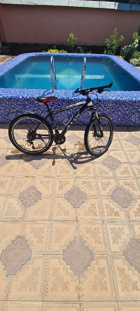 Велосипед в хорошем состоянии алюминиевые  рама-16 балон-26