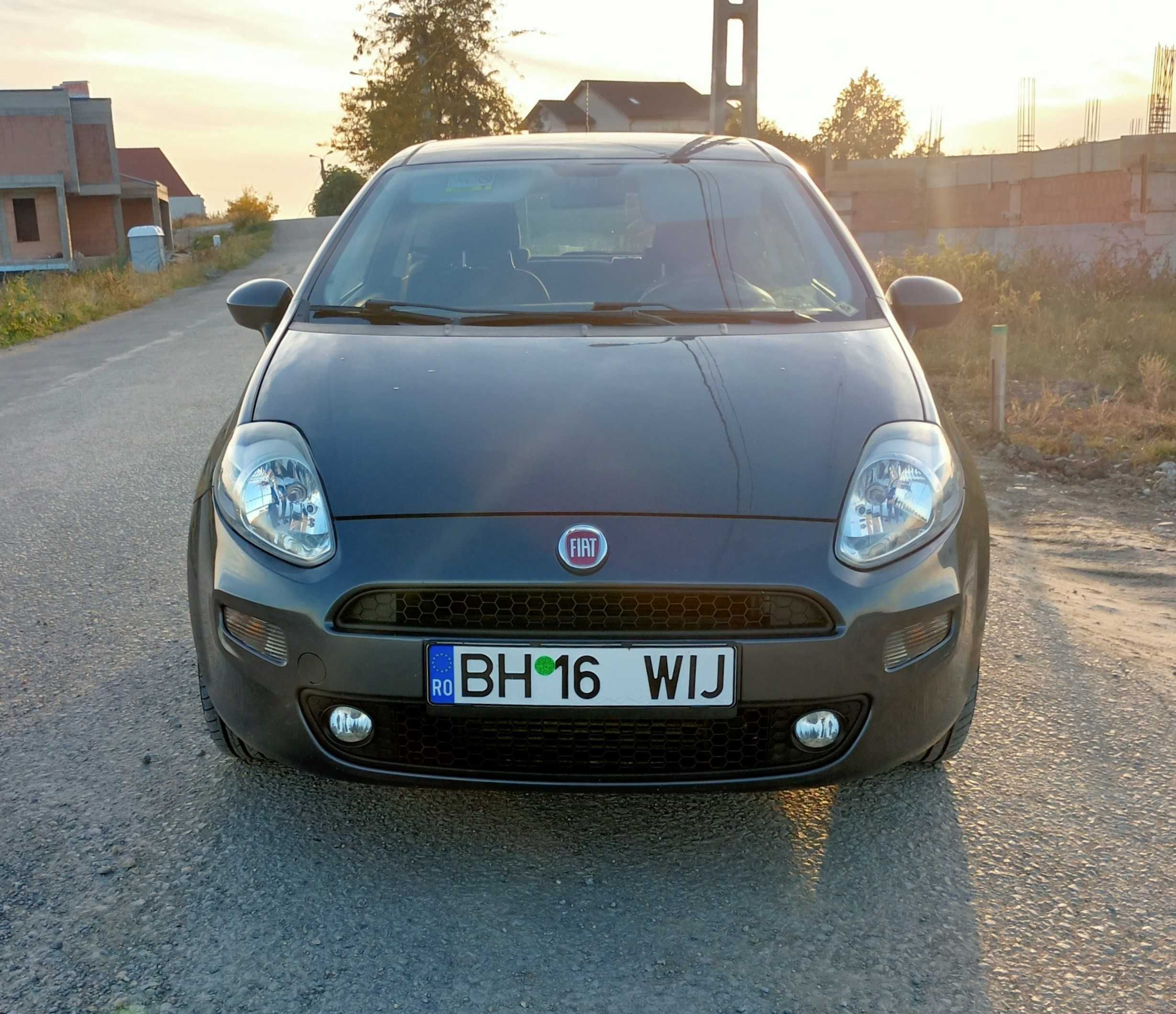 Fiat Grande Punto III 1.3 MultiJet/2015+un set roti iarna -  Impecabil