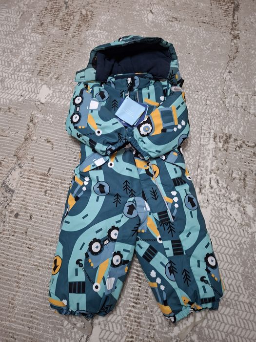 Продам новый детский комбинезон