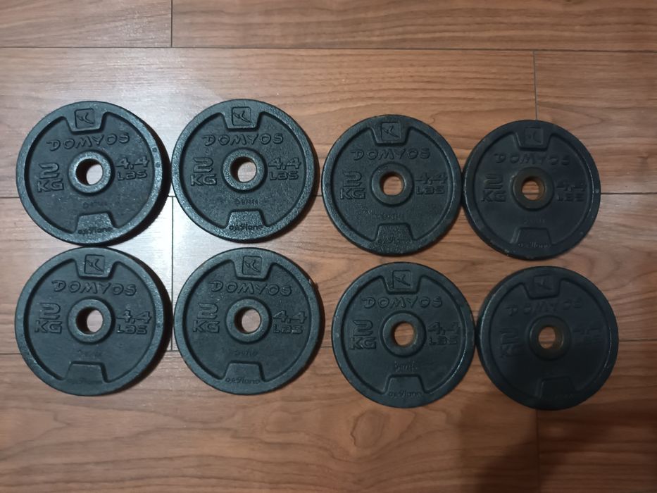 Set 2 gantere cu 8 discuri fonta de 2 kg