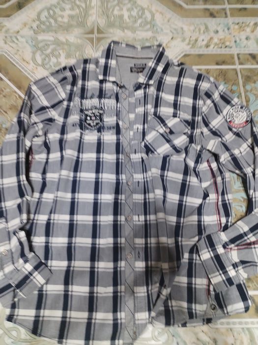 Vând cămăși Camp David.