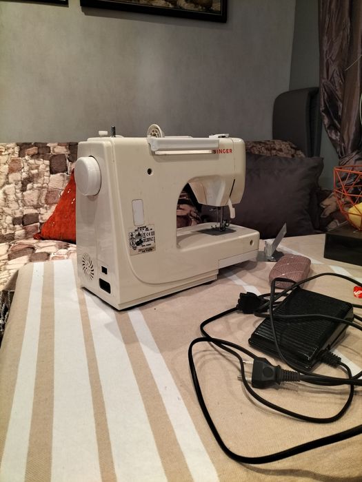 Mașina de cusut marca Singer