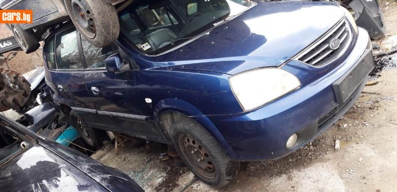 Киа каренс 2.0crdi