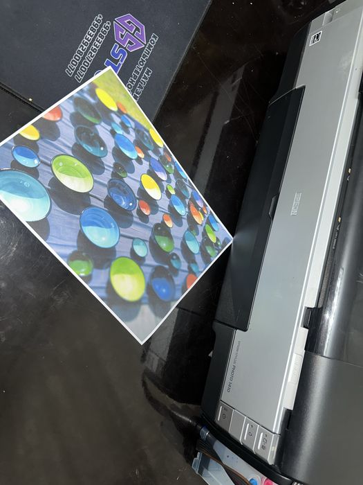 Epson Stylus PHOTO 1410 A3 pechatlari tinniq aybi yoq holati ideal